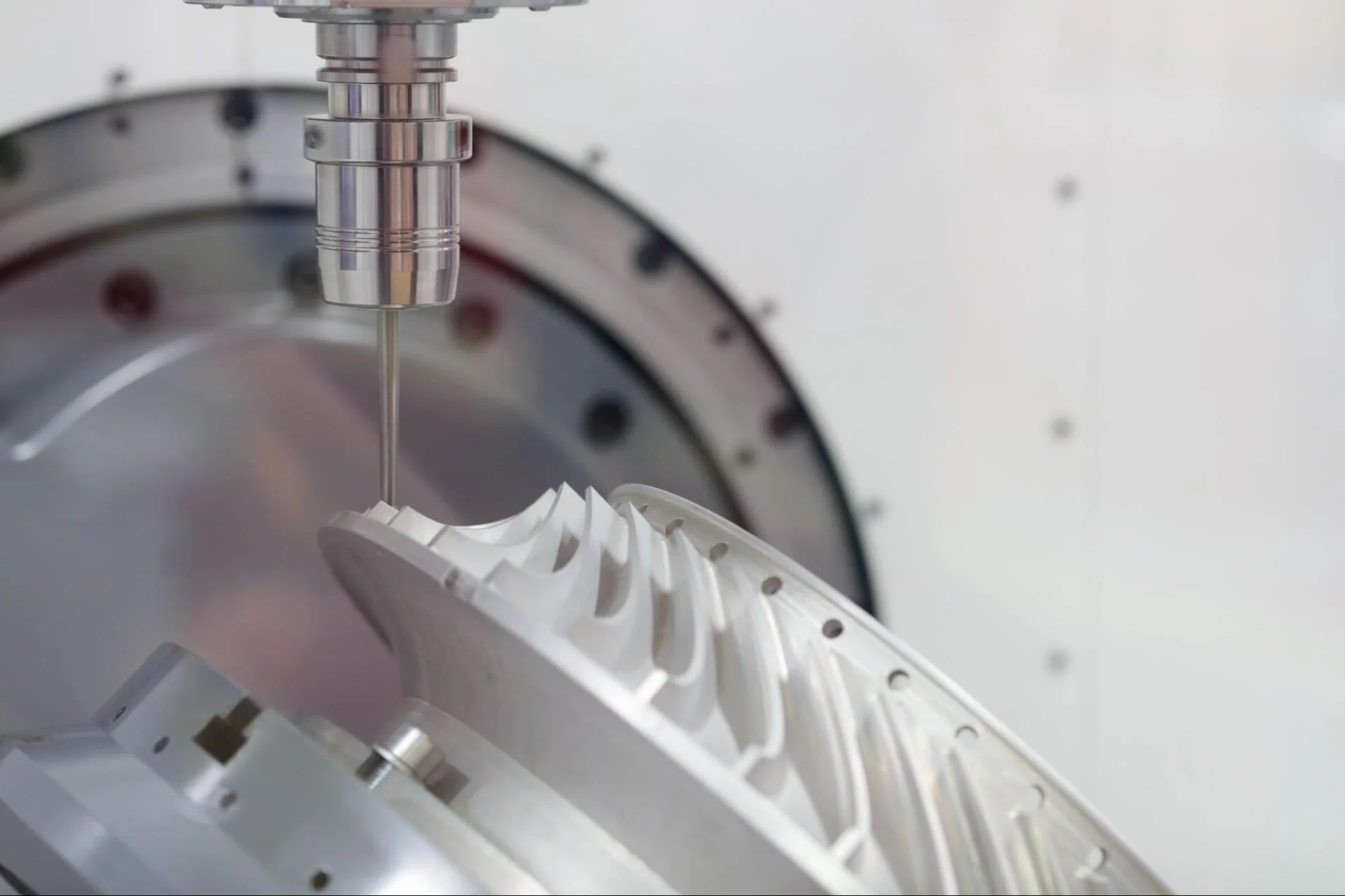 Advanced 5-axis CNC machining center producing high-tolerance industrial components
